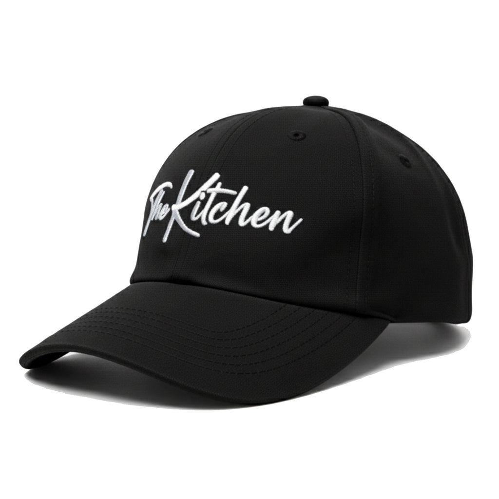 Black cap with 'The Kitchen' text on a white background