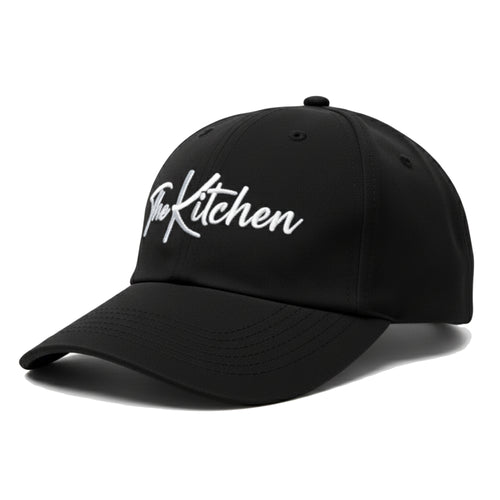 Black cap with 'The Kitchen' text on a white background