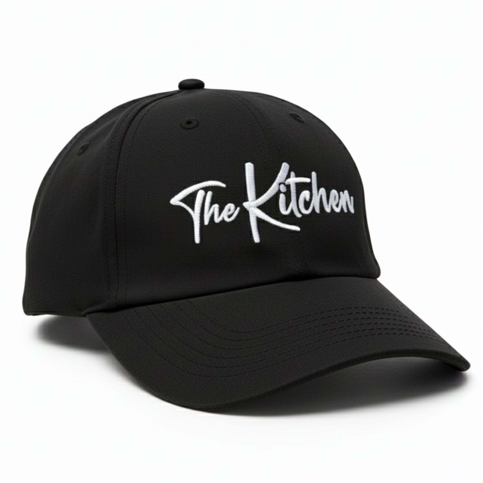 Black cap with 'The Kitchen' text on a white background