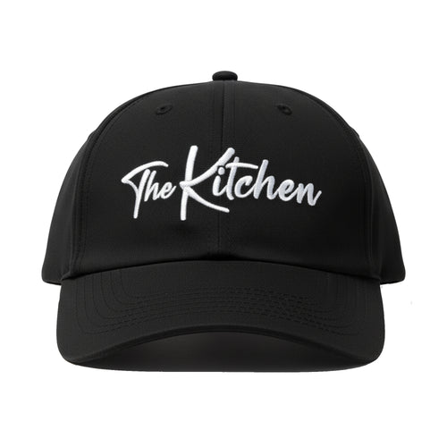 Black cap with 'The Kitchen' text on a white background