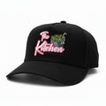 Black cap with 'The Kitchen' text and pizza graphic on a white background