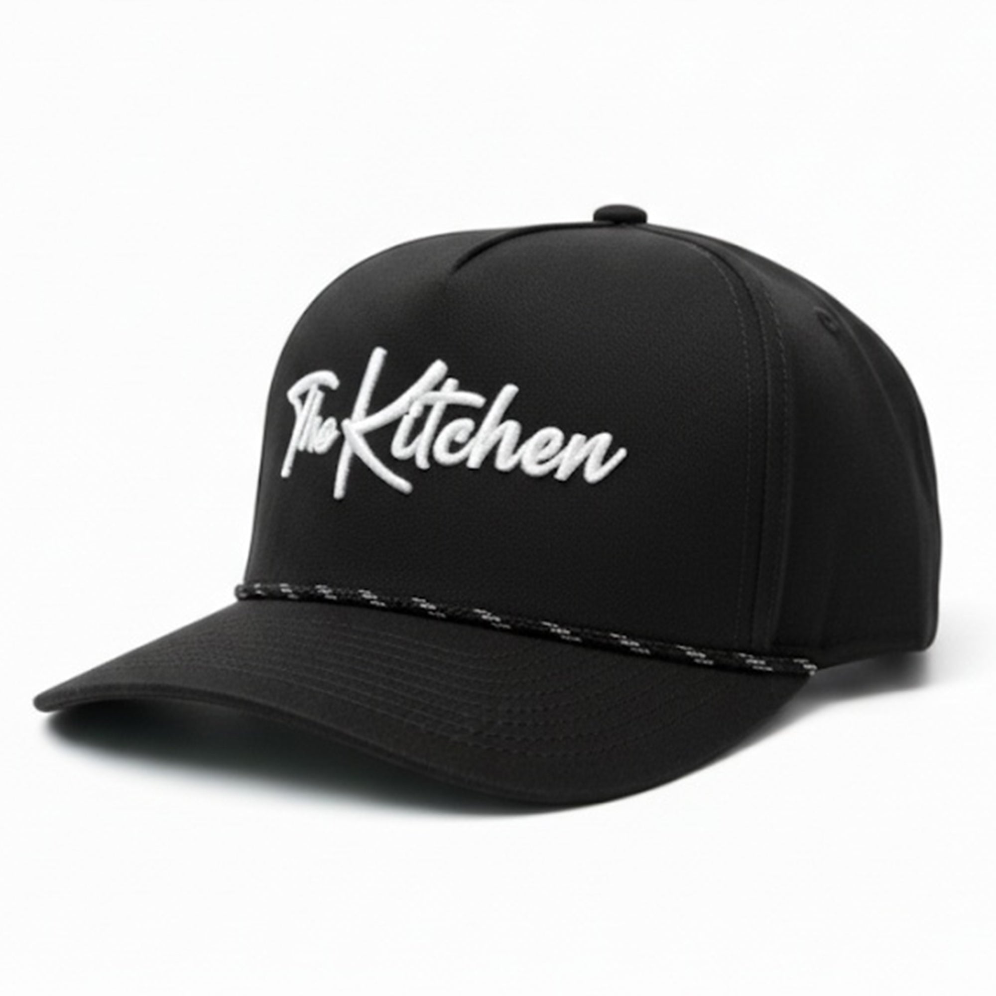 Black cap with 'The Kitchen' logo on a white background
