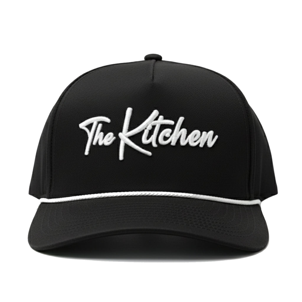 Black cap with 'The Kitchen' text on a white background