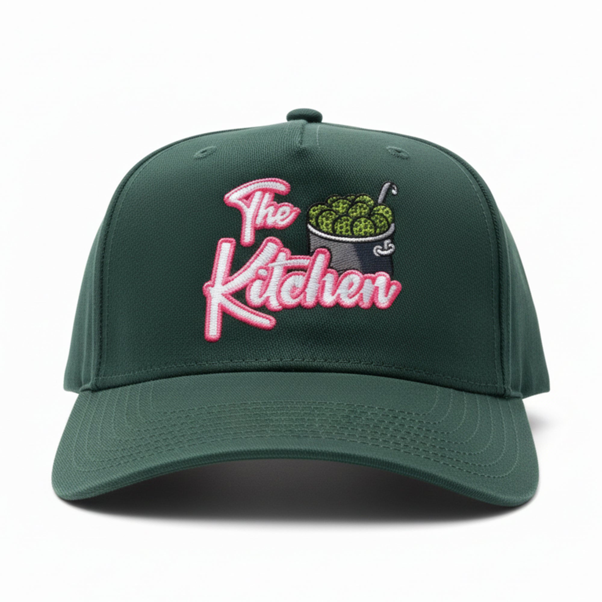 Green cap with 'The Kitchen' embroidery on a white background