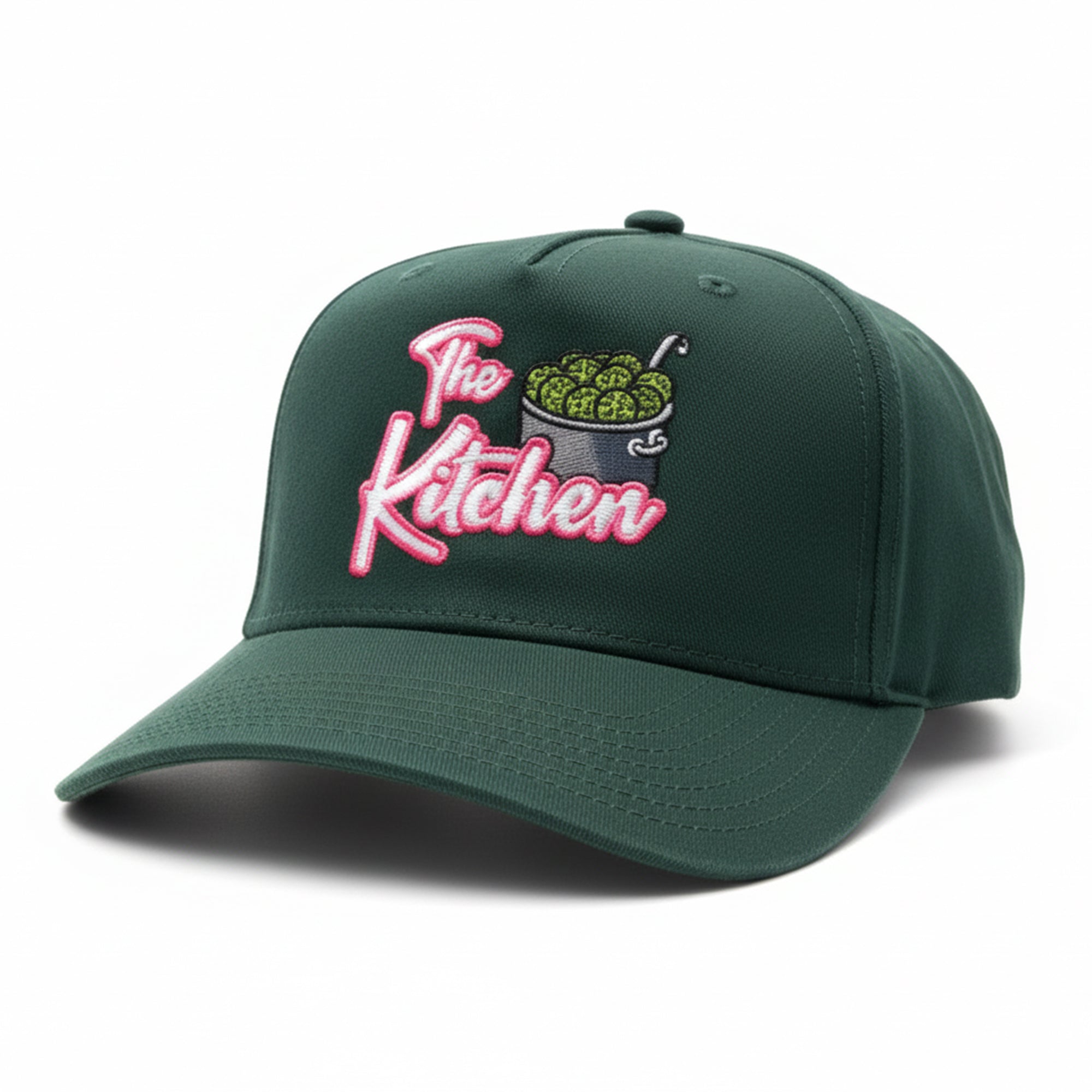 Green cap with 'The Kitchen' embroidery on a white background
