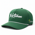 Green cap with 'The Kitchen' and 'The Masters' logos on a white background