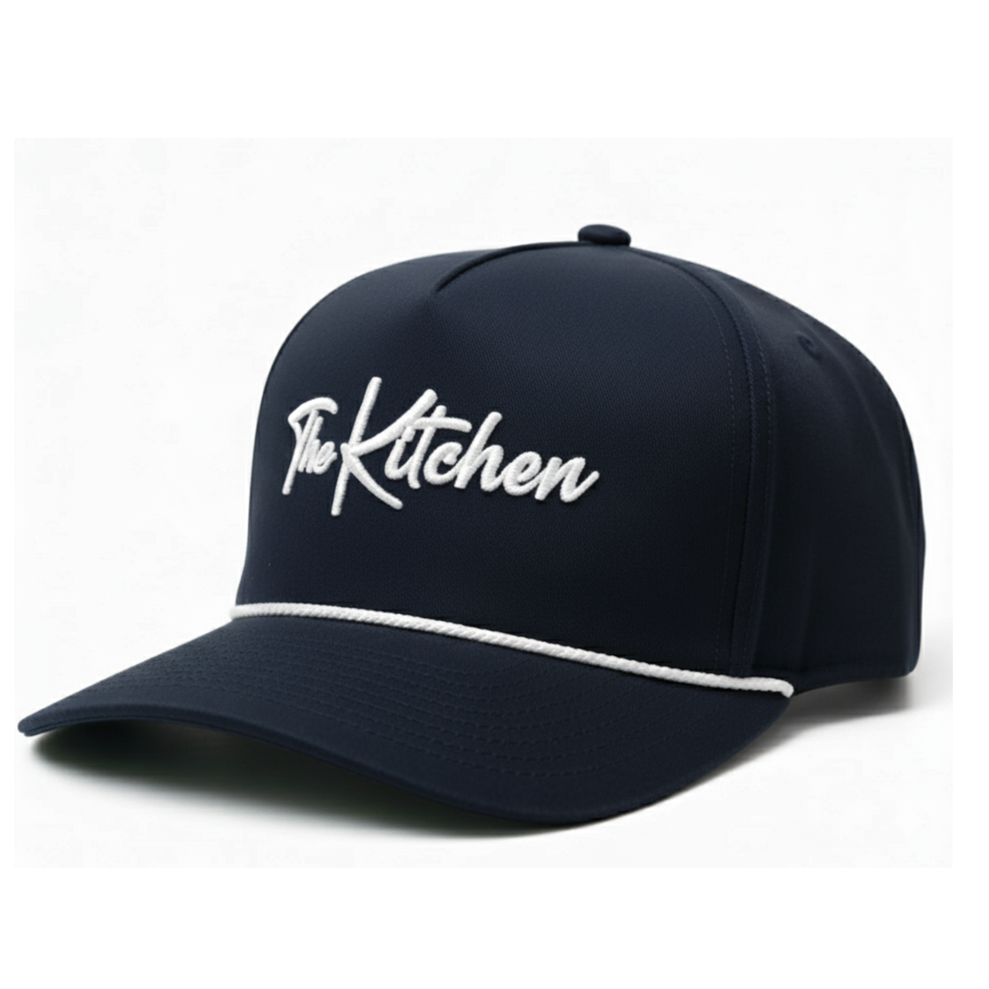 Navy blue cap with 'The Kitchen' logo on a white background